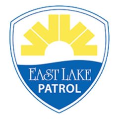 Logo for East Lake Patrol. Shield shape with East Lake rising sun image with the words "East Lake Patrol" under the sun.